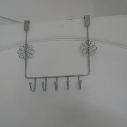 silver over door flower hanger in good condition