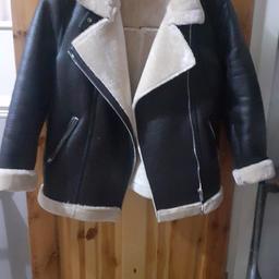Warm leather look with fur lining only worn a couple of times would fit size 10 to 12