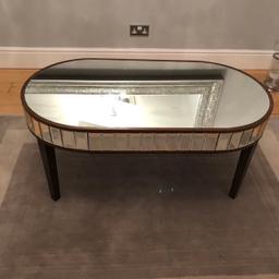 Absolutely beautiful, antique style mirrored coffee table with dark brown wood and four wooden legs. It has two drawers hidden on either side. Purchased at LauraAshley Home for £550 3 years ago. 

Delivery is available for an extra £20 anywhere in the Medway area x

Please do not ask if still available if item is not marked as sold x