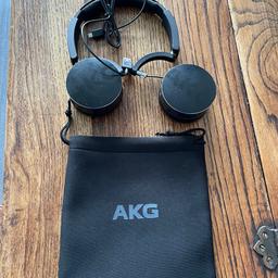 AKG over ear headphones.one side have popped out but headphones work fine