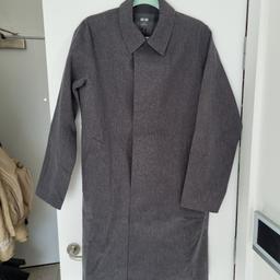 UNIQLO Men rain coat, worn 1 time. XS but fit S