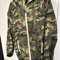 Good condition camouflage jacket with hood