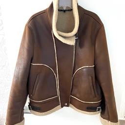Hi ladies welcome to this gorgeous looking style Zara Faux Leather Shearling Double Faced Biker Jacket Size XL in perfect condition thanks