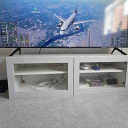 Great Condition, With closed storage you can keep things nice and tidy. This TV bench has both, and an adjustable shelf in each section too.

Selling just because of upgrading bigger one.