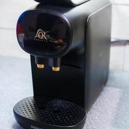 Lor barista coffee machine by Philips accepts double lor pods plus single nespresso pods comes with water tank in excellent condition. Only had a few months barely used.