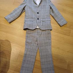 Next boys wedding suit

Suit jacket and trousers age 5
Shirt is aged 7
Shoes size 13

Only worn once lovely suit really soft shoes need abit of polish on the front ( kids will be kids )
