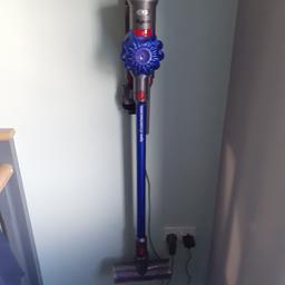 working dyson v7. comes with attachments and wall mount. Head new head couple of months ago.
