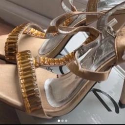 1 x pair gold heeled sandals new in box
1 x pair black heeled sandals new in box
1 x pair red court shoes good condition 
1 x pair trainers new in box
1 x pair brown faux suede boots good condition 
Collection Thornton
