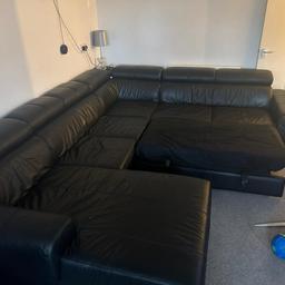 black leather corner sofa bed with storage.  Good used condition . very heavy, will require minimum two people to move. Any questions please feel free to ask £625 ono