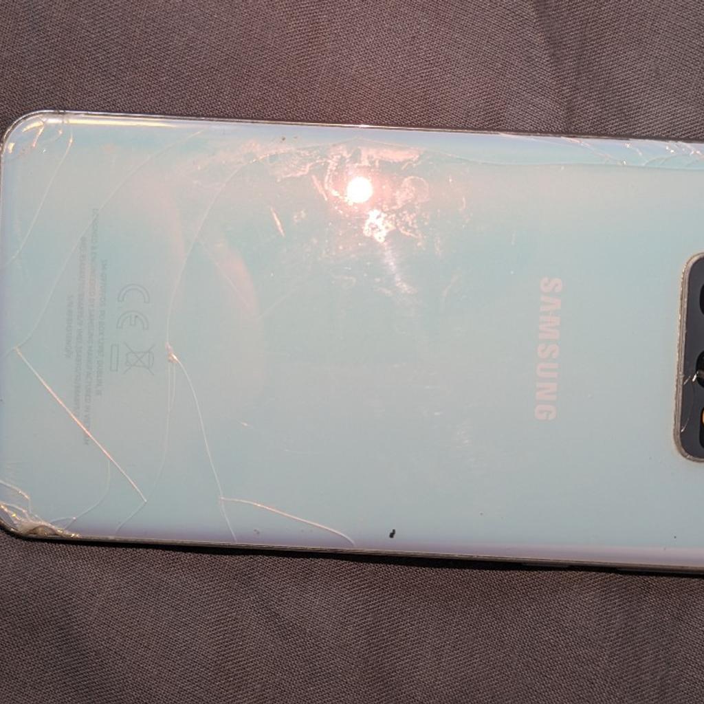 Samsung galaxy s10e in white phone works perfectly front and back both cracked so selling cheap easy fix for someone that knows what to do