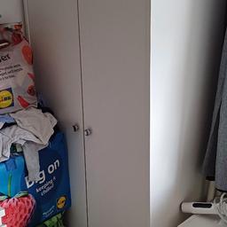 set of white wardrobe drawers and bedside table. perfect for a new nursery. really good condition and new knobs on the draws and bedside table. brought for 150. apologies for the pictures redoing my children's room