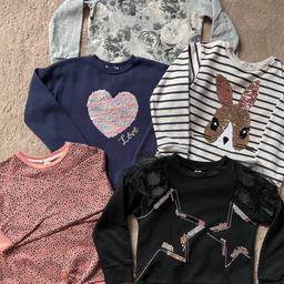 Bundle of girls sweatshirts
Pink animal print sweatshirt with tie hem from H&M - age 6-8 years - very good condition 
Black sweatshirt with embroidered sequin stars and tulle ruffles on the shoulders - age 7 - very good condition 
Navy blue sweatshirt with flip sequin heart - age 7-8 - good used condition 
Cream striped sweatshirt with navy blue stripes and flip sequin bunny rabbit - age 6-8 - good used condition, slightly bobbled 
Grey floral print sweatshirt from Gap - age 6-7 - slightly faded and bobbled

* PLEASE VIEW MY OTHER ITEMS - HAPPY TO COMBINE POSTAGE *

** FROM A SMOKE FREE HOME **