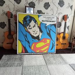 as you can see I have a large picture of Superman in fair condition has a few marks but nothing to write home about I would prefer collection only had it for some time but it's just been sitting under my bed