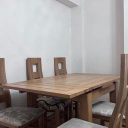 An extendable table with 6 chairs | to see measurments link for table can be found online: https://www.oakfurnitureland.co.uk/furniture/dorset-natural-solid-oak-3ft-extending-table-and-4-scroll-back-plain-grey-fabric-chairs/5424.html