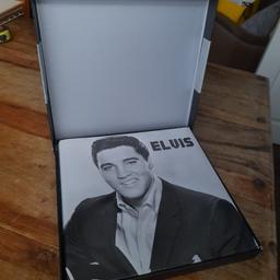 exclusive only to Marks and spencer  this hardback book inside an outer box ,full of photo pictures, large book approx 11 inches by 11 inches with duust cover , ideal present for Elvis fans ,,