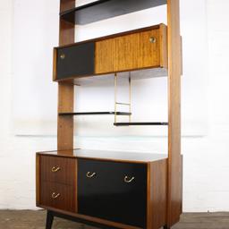 McClintock Antiques

A 1960's G Plan storage unit/ room divider, Tola and Black

Height 193cm
Length 96cm
Width 47cm

Condition good

Delivery in London £45

McClintock Antiques