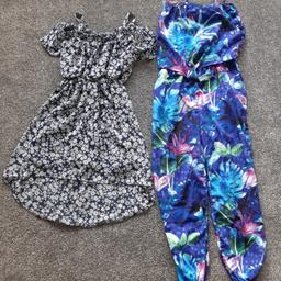 Girls Jumpsuit - Age 10 - Blue Zoo
Dark blue ditsy cold shoulder, high/ low dress - size EU 140 - C&A
Come from pet free and smoke free home