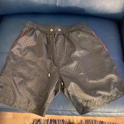 Genuine Gucci shorts
New without tags
Colour-Pewter/green/rec
Style-leisure
Pattern-Classic Gucci print with green/red Gucci stripes on each side of legs
Size-Large

Purchased from Selfridges
Paid £220 Selling price £120 although open to realistic offers
Never worn as bought the wrong size