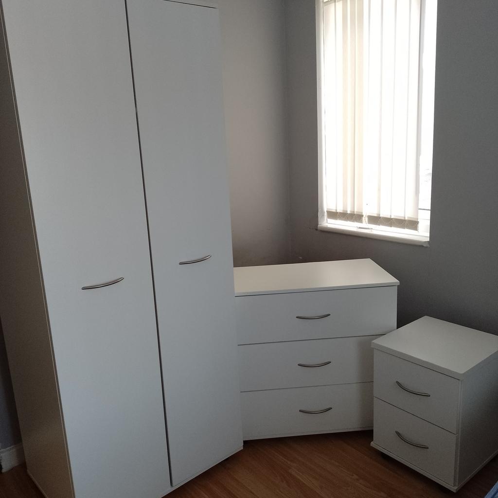 Wardrobe, chest of drawers and bedside cabinet. Factory built. Good condition. Buyer collects.