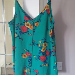 Women's Floral Cami Top.
Papaya, Size 12.
Collection only.