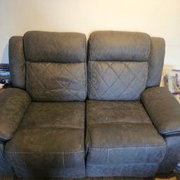 2 piece suade recliner sofa.
2 seater has a few marks and one of the 2 recliners is faulty (bent) but still functions as it should.
3 seater sofa is immaculate apart from 1 small paint mark on the back which can't be seen.