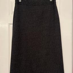 Charcoal grey, stretch jersey midi length pencil skirt, size 14 by Berkertex.
Worn a couple of times but still in great condition.