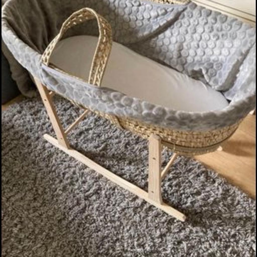 Clare de lune Moses basket with rocking stand, like new as my grandson didn’t like sleeping in it. Includes fitted sheet.
