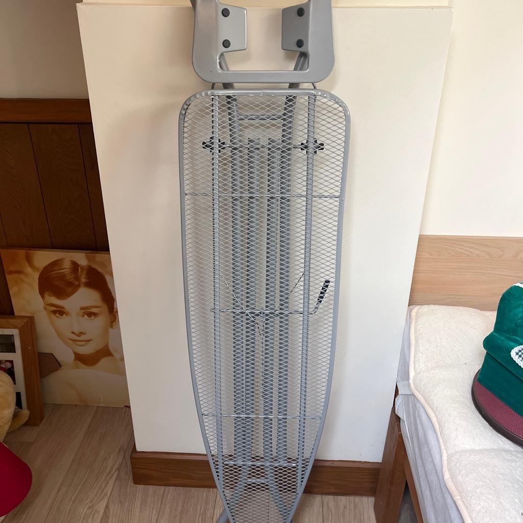 Grey ironing board. Fit for purpose.