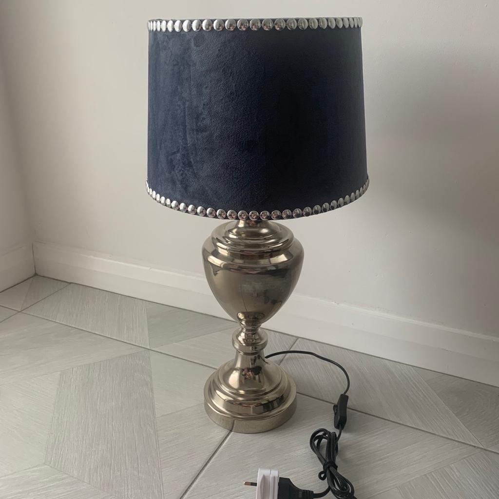 Navy blue table lamp with silver stud detail and silver base. In perfect working order only getting rid due to changing the colour scheme