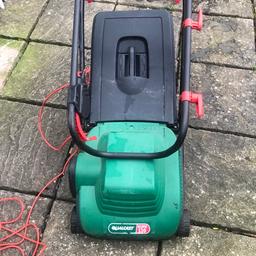 Qualcast 320 lawnmower with grass box , blades work but a bit of rust on them , needs wD40 but otherwise ok