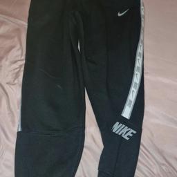 mens black Nike joggers they say a medium but there more like a large /xl good clean condition