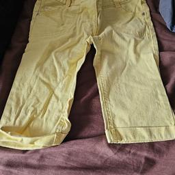 yellow shorts for girls 5-6 years old kinda brand new and has been worn once