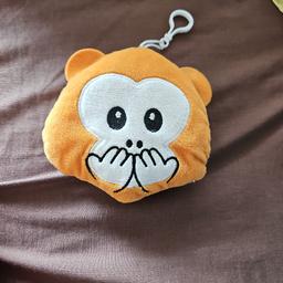 it's a orange monkey keychain for boys or girls and maybe toddlers but I think mostly for girls and boys over the age of 6