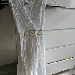 Never worn dress from Greece size 6/7