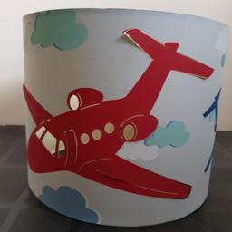 Kids lampshade with red and blue aeroplanes on a background of blue sky and clouds. Used, has slight wear (as pictured) but in a presentable clean condition and fit to brighten up a kids bedroom. As well as free collection from us, we also offer UK postal delivery for £3.19.