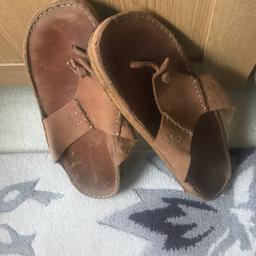 Here I have some mens leather sandles worn around 5 times picture isn’t really good paid £70