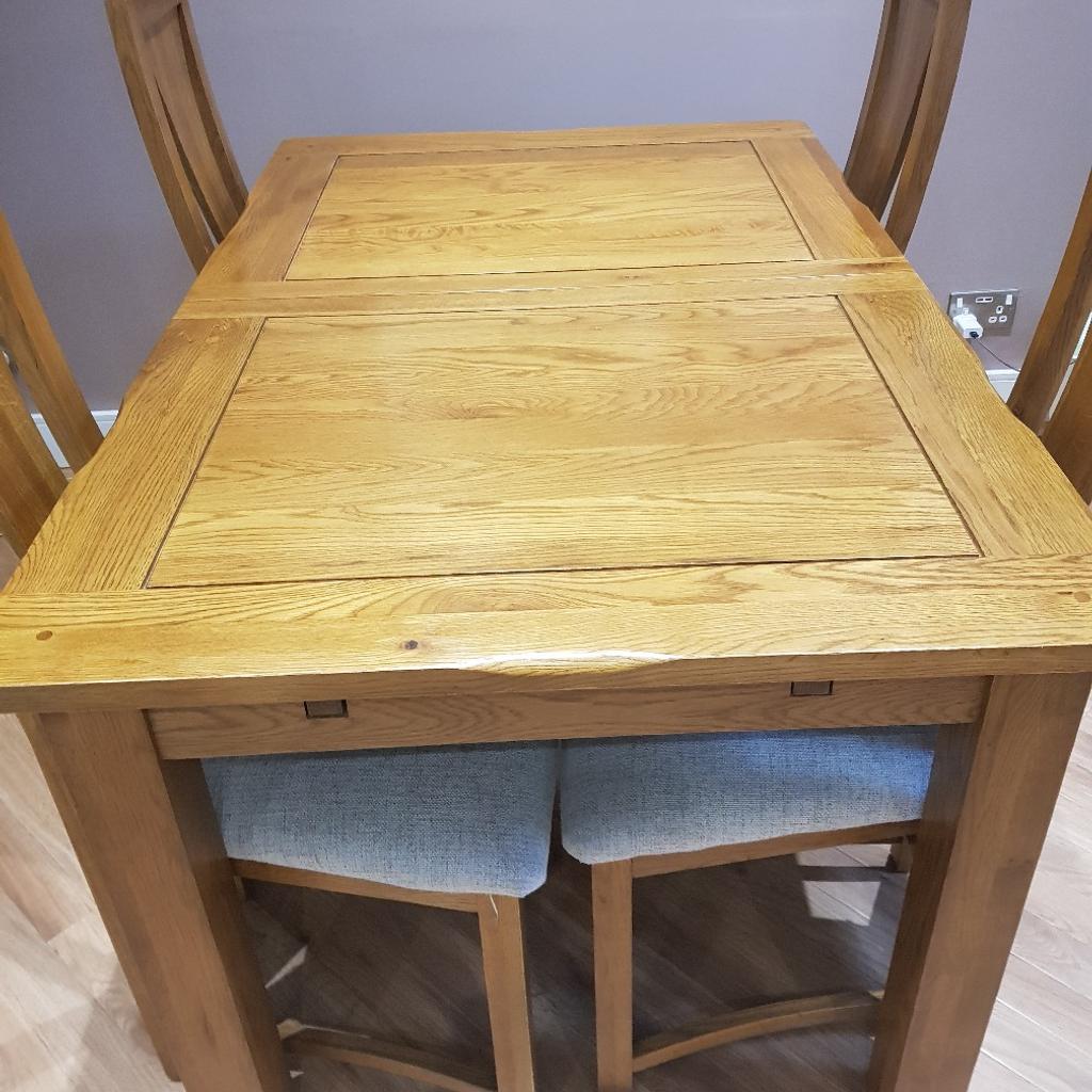 oak furniture land extendable table for sale cost £600 new asking for £100 dose not included chairs