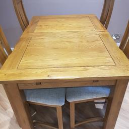 oak furniture land extendable table for sale cost £600 new asking for £100  dose not included chairs
