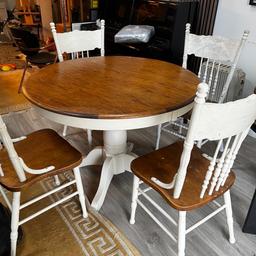 Beautiful dining set and chairs- solid wood seat.
Table measures approx 100cm diameter
Some minor paint marks on chair seat but easily removable. Whole set would look like new with a coat of paint