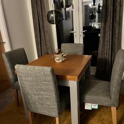 Solid wood table and 4 chairs
Grey fabric chairs tables with grey legs with wood top, extendable top to seat 6
Purchase from next
In good condition
Collection only