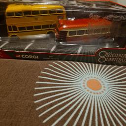 four Corgi buses in good condition in boxes ok