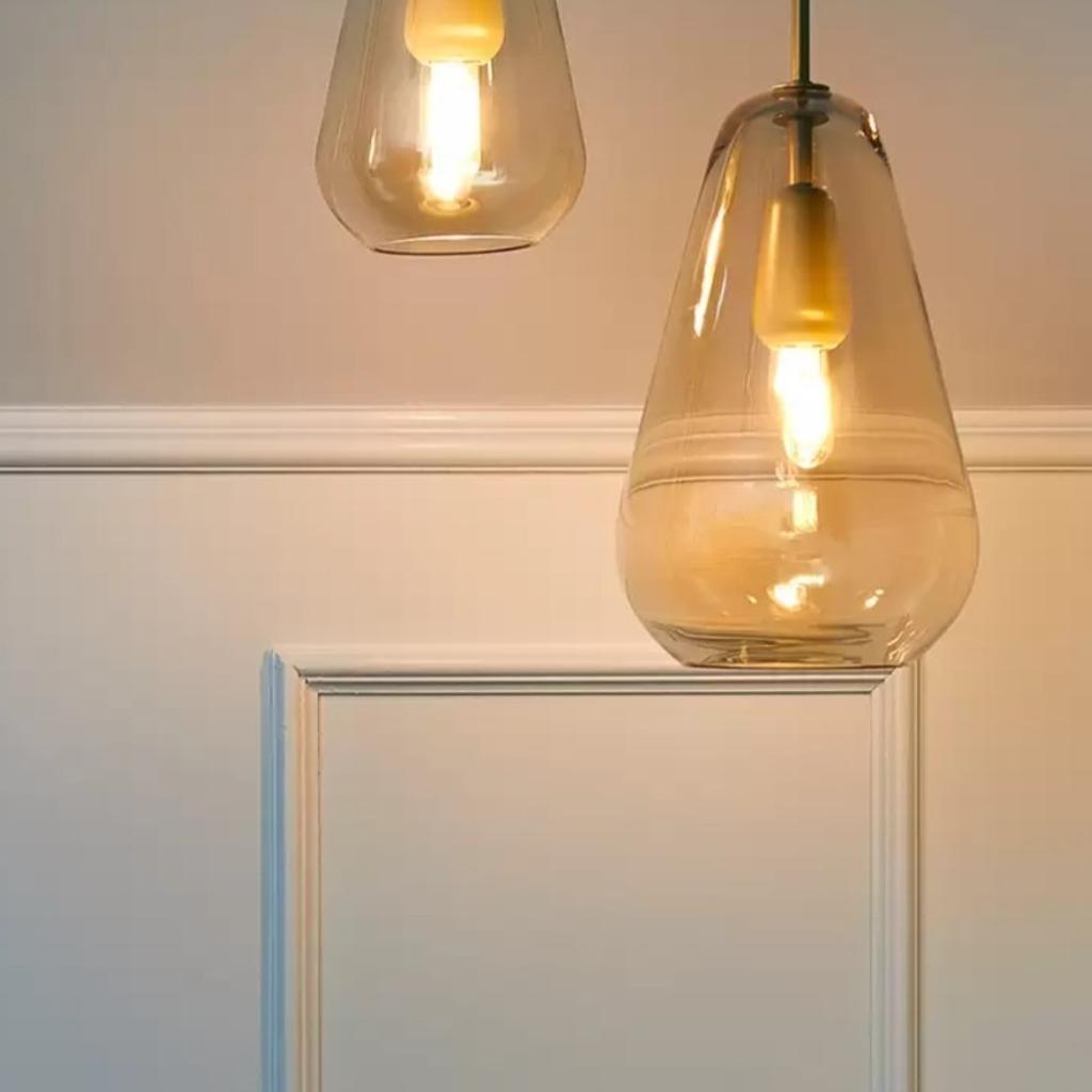 Light made of materials of the highest quality
Crafted by skilled artisans mouth blown drop shaped glass.

Socket type bulb: Nordic gold /gold E14

Dimension: Small 160mmx 315mm

Material: Metal and glass

Weight : 1.18 kg

Cable colour: Black

Voltage 220-240V

2 x available
Both are BRAND NEW and boxed
@ £150 each