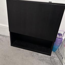 IKEA wall cabinet with shelf and front door and hinges attached.