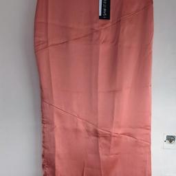 New with tags, ladies long skirt, approx 35 inch long, size 10,rose pink colour, excellent condition, free delivery with asking price