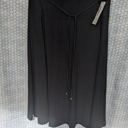New with tags black skirt,size XXL would fit 16-20 , elasticated waistband, approx 25 inch long , great condition, can post for cost