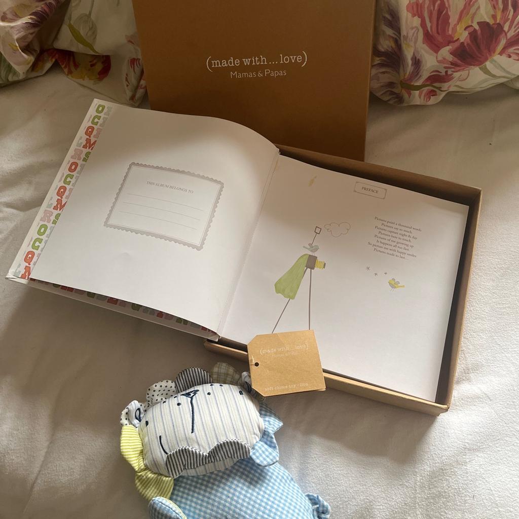 Brand new photo album and toy unwanted gift