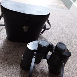 Carl veitch 20 x 50 binoculars with carry case in very good condition.