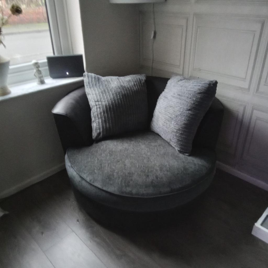 large swivel cuddle chair in black & Grey . collection only