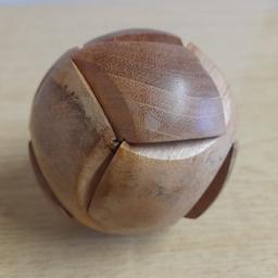Handmade Wooden Puzzle Ball

Postage possible at buyer's expense with payment by PayPal please so buyer protection will apply 