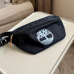 Black bum bag. Only worn a few times. In mint condition. Very spacious from inside. In its original form. 

Message me for any questions.